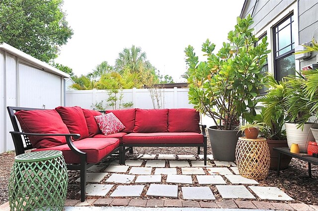 2859 Dartmouth Ave N, Saint Petersburg, FL 33713 - view of patio / terrace with outdoor lounge area and fence