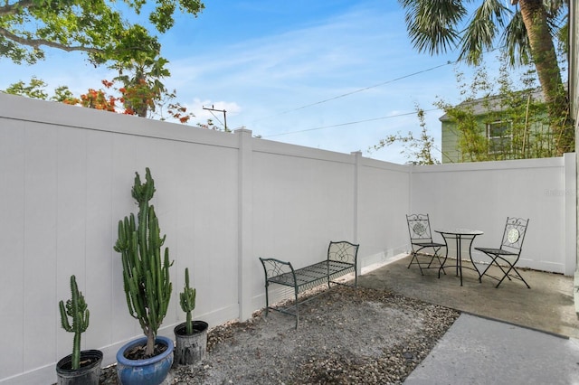 2859 Dartmouth Ave N, Saint Petersburg, FL 33713 - view of patio / terrace featuring a fenced backyard and outdoor dining area