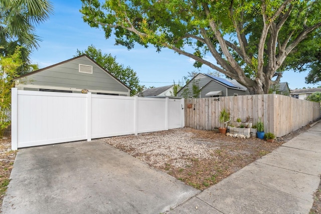 2859 Dartmouth Ave N, Saint Petersburg, FL 33713 - view of yard with fence and a detached garage