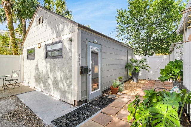 2859 Dartmouth Ave N, Saint Petersburg, FL 33713 - view of outbuilding with a fenced backyard and an outdoor structure