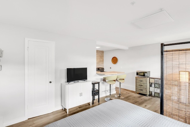 2859 Dartmouth Ave N, Saint Petersburg, FL 33713 - bedroom with wood finished floors and baseboards