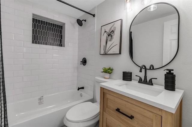full bath featuring toilet, washtub / shower combination, and vanity