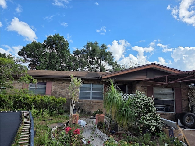 115 Marjorie Ave, Auburndale, FL 33823 - view of front of home with brick siding