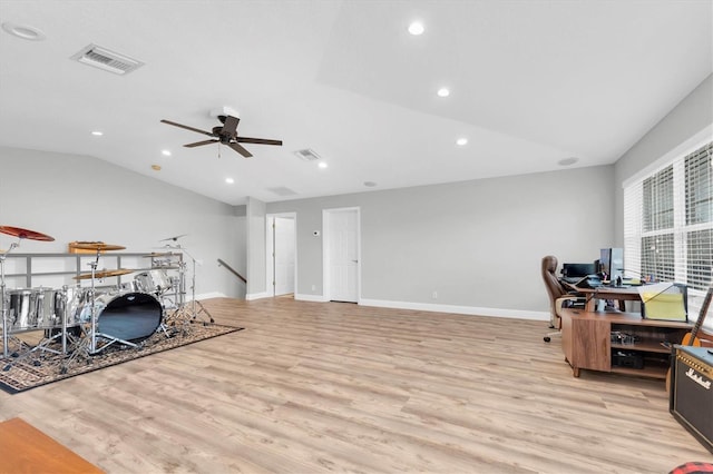 office area featuring lofted ceiling, light wood-style floors, a ceiling fan, recessed lighting, and baseboards