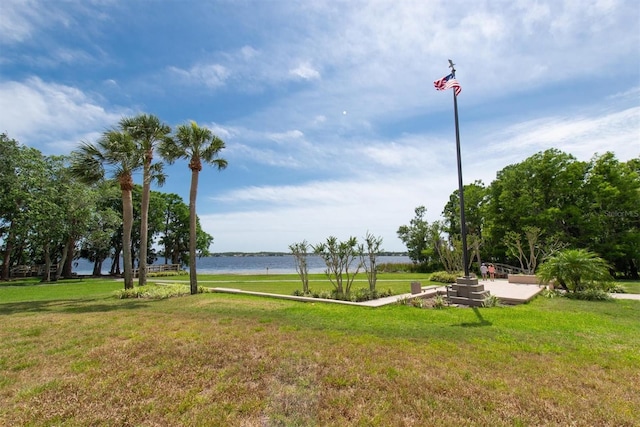 3716 Janus Way, Palm Harbor, FL 34685 - view of home's community featuring a water view and a yard