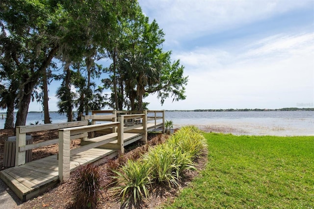 3716 Janus Way, Palm Harbor, FL 34685 - dock area featuring a water view and a lawn