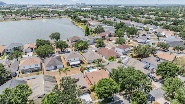 aerial perspective of suburban area with a large body of water