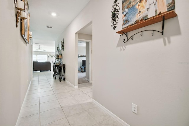 13603 Wild Ginger St, Riverview, FL 33579 - hall featuring light tile patterned floors and baseboards