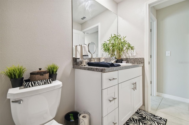 13603 Wild Ginger St, Riverview, FL 33579 - half bath featuring tile patterned floors, toilet, and vanity