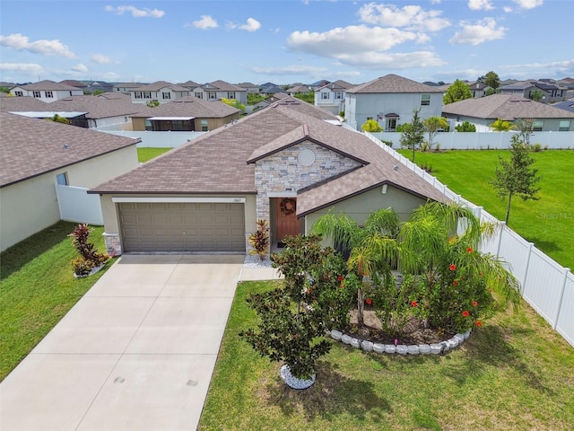 13603 Wild Ginger St, Riverview, FL 33579 - view of front of home with a residential view, an attached garage, concrete driveway, and a shingled roof