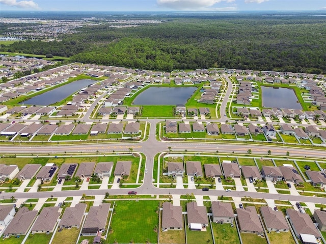 13603 Wild Ginger St, Riverview, FL 33579 - aerial overview of property's location featuring nearby suburban area, a forest, and a large body of water