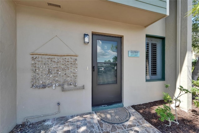 1028 Apollo Beach Blvd Unit 21, Apollo Beach, FL 33572 - entrance to property featuring stucco siding