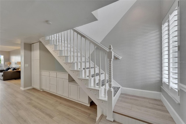 1028 Apollo Beach Blvd Unit 21, Apollo Beach, FL 33572 - stairway with wood finished floors and baseboards