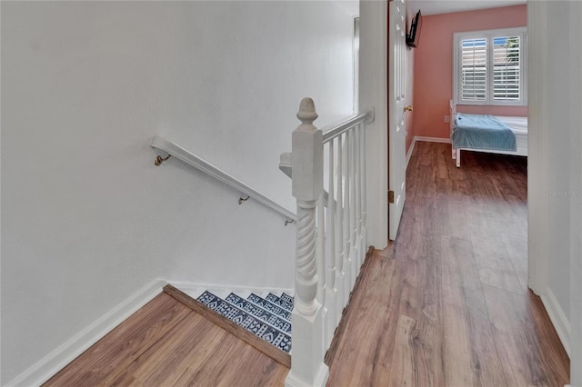 1028 Apollo Beach Blvd Unit 21, Apollo Beach, FL 33572 - stairs featuring wood finished floors and baseboards