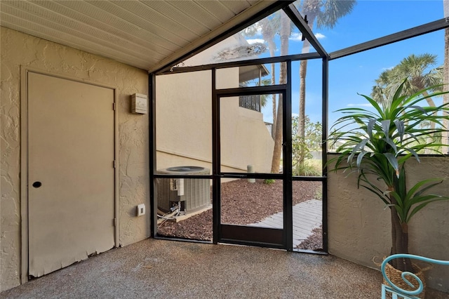 1028 Apollo Beach Blvd Unit 21, Apollo Beach, FL 33572 - unfurnished sunroom featuring vaulted ceiling