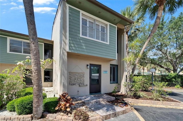 1028 Apollo Beach Blvd Unit 21, Apollo Beach, FL 33572 - view of front facade with stucco siding