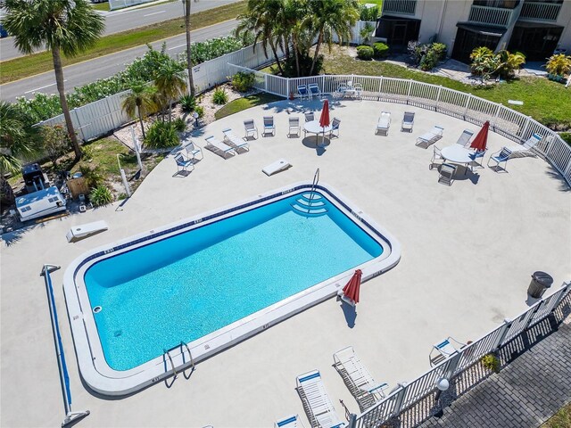 1028 Apollo Beach Blvd Unit 21, Apollo Beach, FL 33572 - community pool featuring fence and a patio area