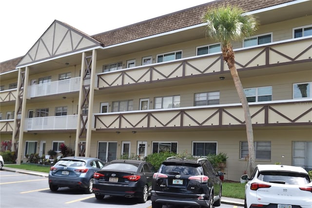 2463 Brazilia Dr Unit 43, Clearwater, FL 33763 - view of building exterior with uncovered parking