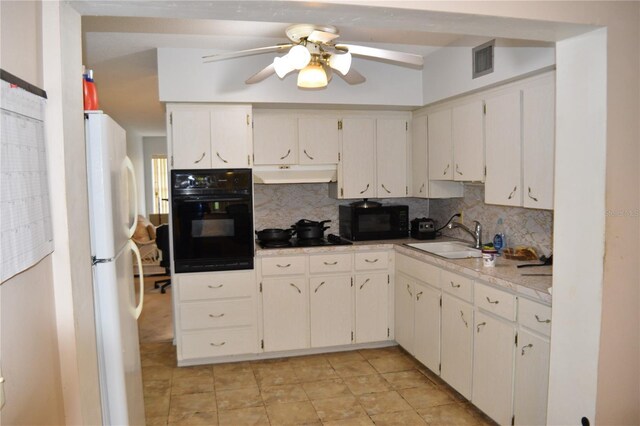 2463 Brazilia Dr Unit 43, Clearwater, FL 33763 - kitchen with black appliances, a sink, under cabinet range hood, tasteful backsplash, and ceiling fan