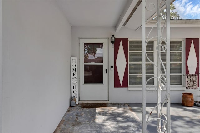 2222 Euclid Cir N, Clearwater, FL 33764 - property entrance with stucco siding