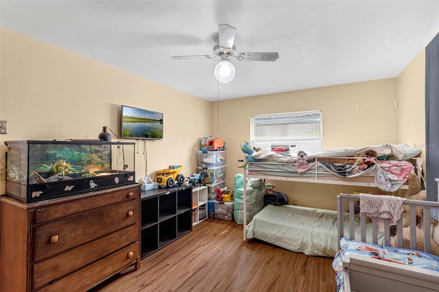 2222 Euclid Cir N, Clearwater, FL 33764 - bedroom with light wood finished floors and a ceiling fan