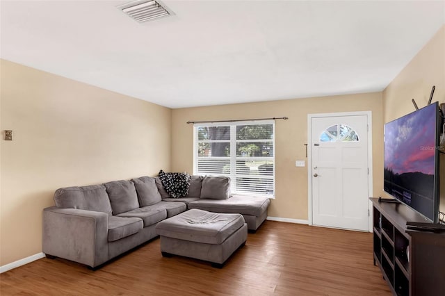 2222 Euclid Cir N, Clearwater, FL 33764 - living area featuring wood finished floors and baseboards