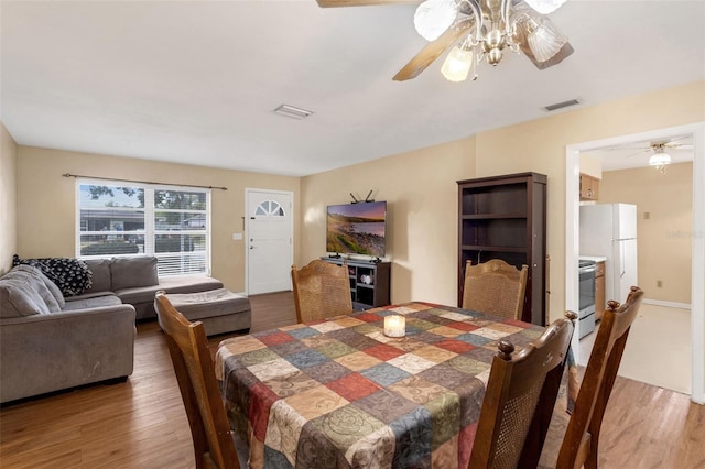 2222 Euclid Cir N, Clearwater, FL 33764 - dining room featuring wood finished floors and ceiling fan