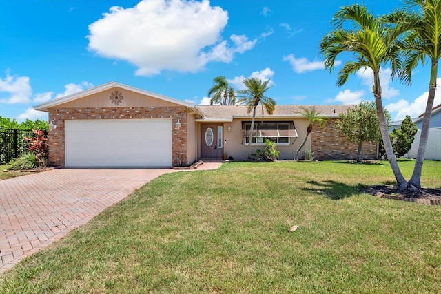 11628 Grove St, Seminole, FL 33772 - single story home with brick siding, decorative driveway, an attached garage, and stucco siding