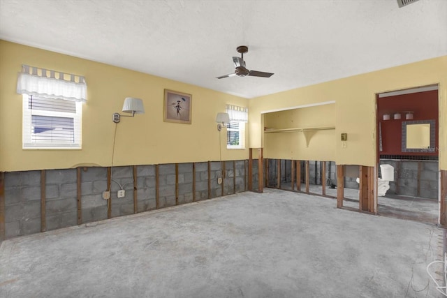 11628 Grove St, Seminole, FL 33772 - carpeted empty room with a ceiling fan