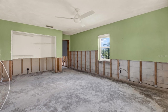11628 Grove St, Seminole, FL 33772 - unfurnished room with ceiling fan and unfinished concrete floors