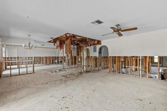 4274 Deleon Dr, Hernando Beach, FL 34607 - misc room with ceiling fan, a chandelier, a textured ceiling, and arched walkways