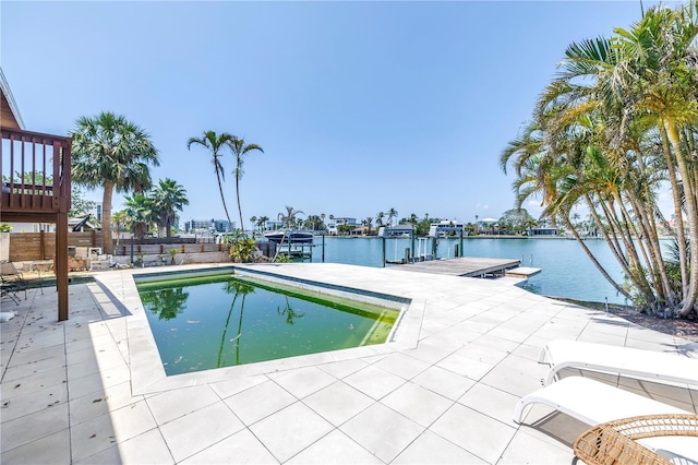 31 Dolphin Dr, Treasure Island, FL 33706 - swimming pool featuring a dock, a water view, and a patio