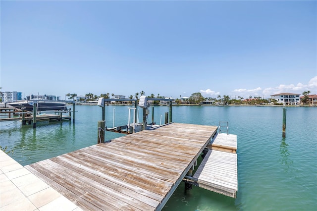 31 Dolphin Dr, Treasure Island, FL 33706 - dock area with a water view and boat lift