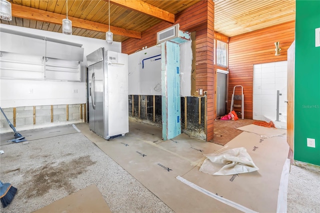 31 Dolphin Dr, Treasure Island, FL 33706 - misc room with wooden ceiling, beamed ceiling, and concrete floors