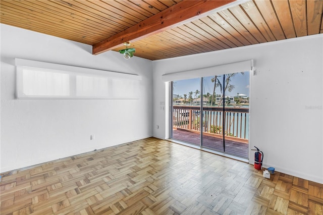 31 Dolphin Dr, Treasure Island, FL 33706 - unfurnished room with a water view, wood ceiling, and beam ceiling