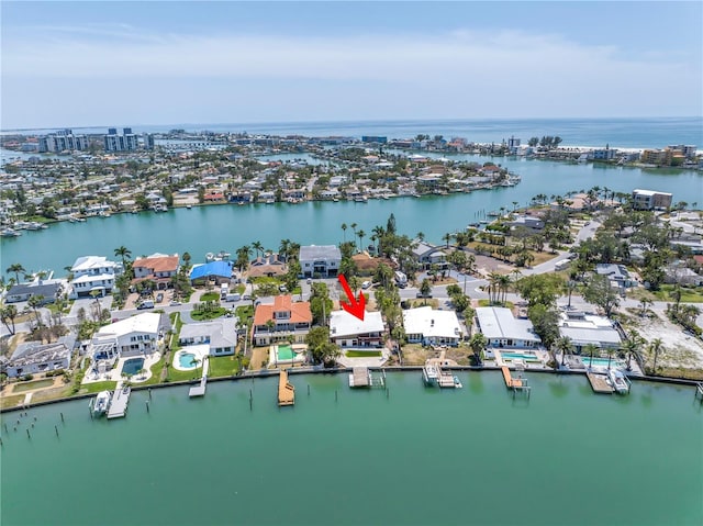 31 Dolphin Dr, Treasure Island, FL 33706 - aerial view of property's location featuring a large body of water and nearby suburban area