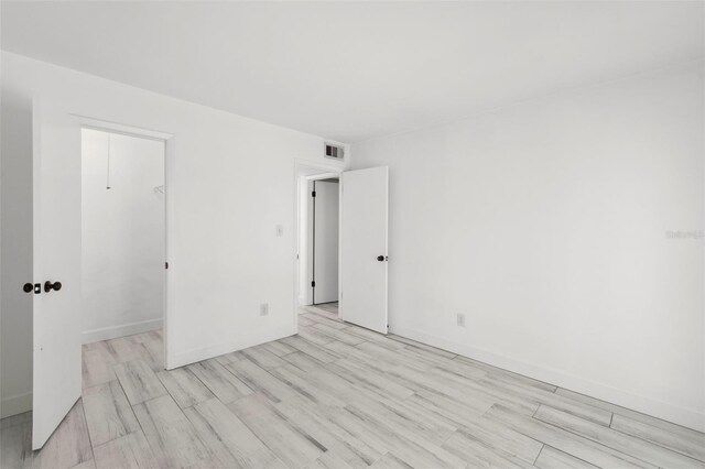 3102 W Horatio St Unit 13, Tampa, FL 33609 - unfurnished room featuring wood finished floors