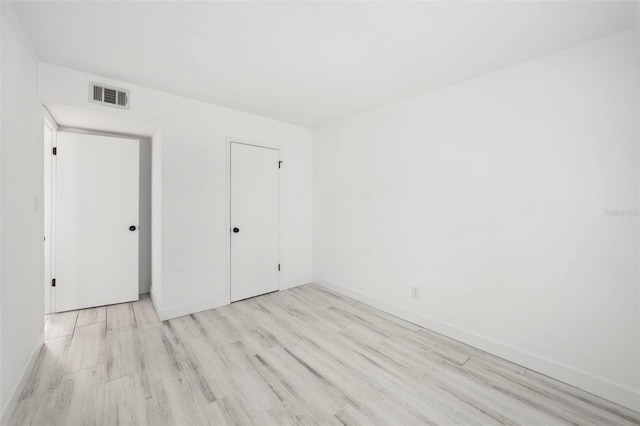 3102 W Horatio St Unit 13, Tampa, FL 33609 - unfurnished bedroom with wood finished floors and baseboards