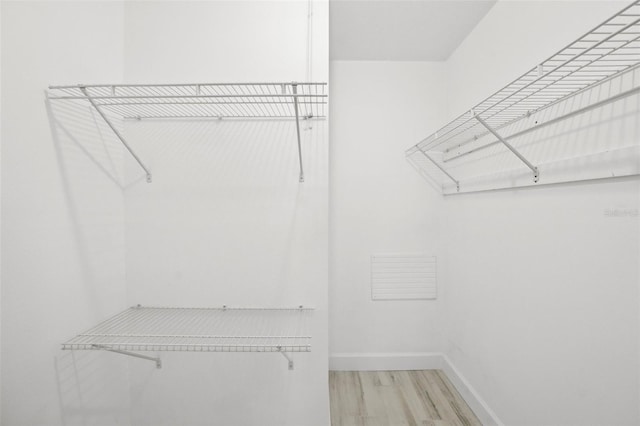 3102 W Horatio St Unit 13, Tampa, FL 33609 - spacious closet featuring wood finished floors