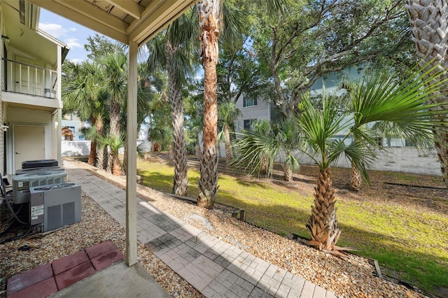 3102 W Horatio St Unit 13, Tampa, FL 33609 - view of patio with central AC and fence