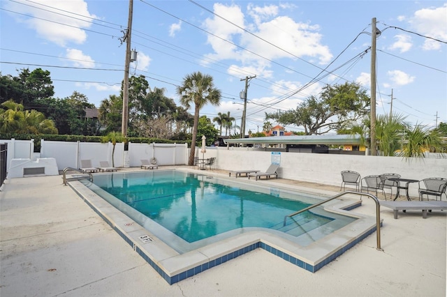 3102 W Horatio St Unit 13, Tampa, FL 33609 - community pool featuring a fenced backyard and a patio area