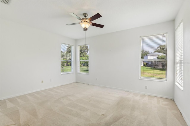 3311 Stonebridge Trl, Valrico, FL 33596 - unfurnished room featuring light carpet, ceiling fan, and baseboards
