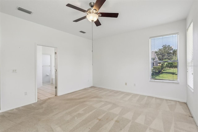3311 Stonebridge Trl, Valrico, FL 33596 - unfurnished room with light colored carpet, a ceiling fan, and baseboards