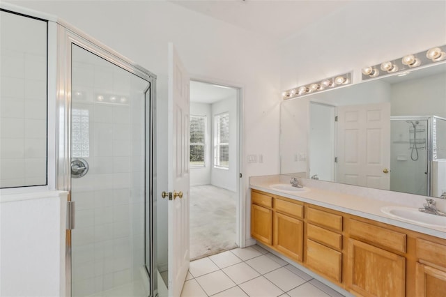 3311 Stonebridge Trl, Valrico, FL 33596 - full bathroom with a stall shower, tile patterned floors, and double vanity