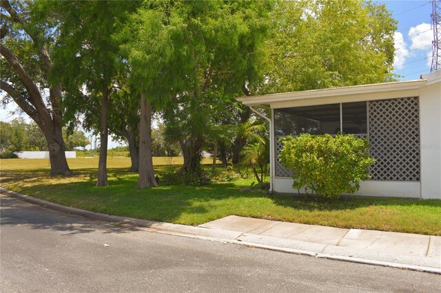 9639 Mainlands Blvd E, Pinellas Park, FL 33782 - view of green lawn