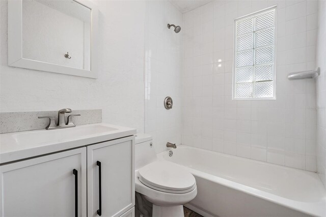 13304 2nd St E, Madeira Beach, FL 33708 - full bath with toilet, vanity, and tub / shower combination
