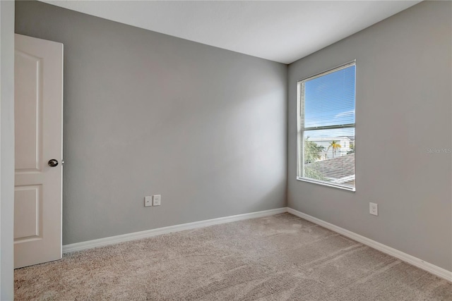 1107 Seminole Sky Dr, Ruskin, FL 33570 - unfurnished room featuring carpet floors and baseboards