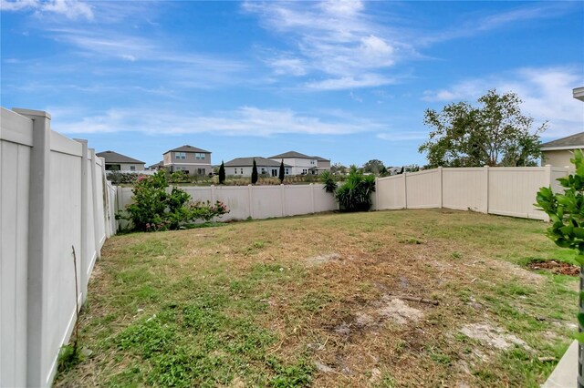 1107 Seminole Sky Dr, Ruskin, FL 33570 - view of yard featuring a residential view
