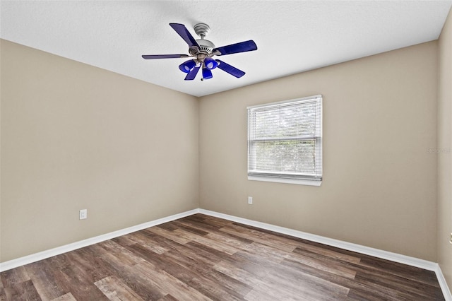 16206 Nottingham Park Way, Tampa, FL 33647 - empty room with ceiling fan, wood finished floors, and baseboards
