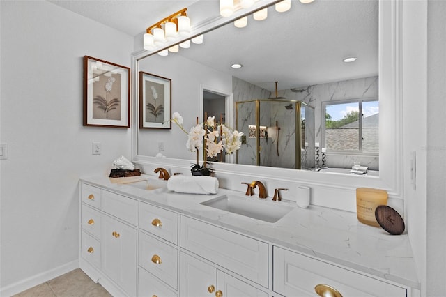 16206 Nottingham Park Way, Tampa, FL 33647 - full bathroom featuring a marble finish shower, double vanity, tile patterned flooring, and a textured ceiling